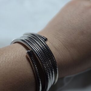 Elegant Silver and Black Coil Bracelet